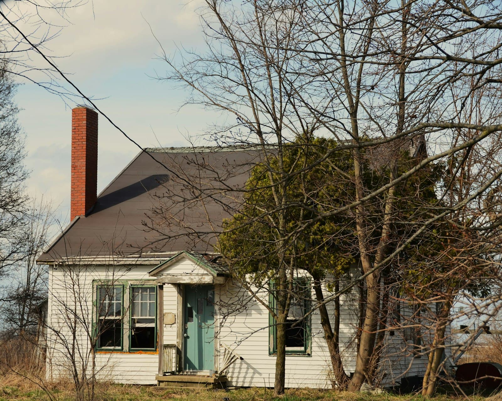 Home with a red brick chimney